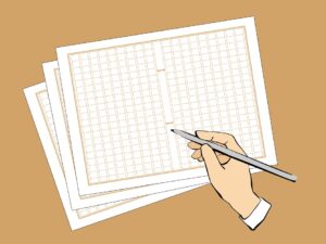 原稿用紙と鉛筆を持つ手